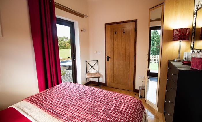 Ash and Sycamore double bedroom with access out on veranda.